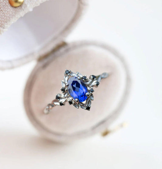 Unique Floral Rose Oval Lab Sapphire and Black Moissanite Ring