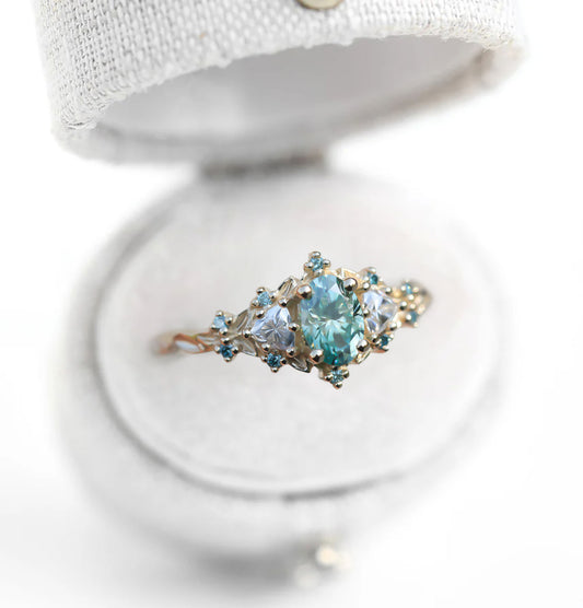 Unique Celeste Rose Oval Teal Moissanite Ring
