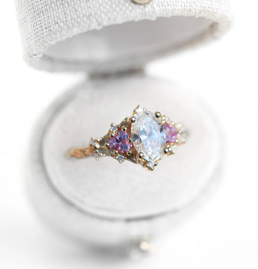 Unique Celeste Rose Three Stone Oval Moissanite and Lab Pink Sapphire Ring