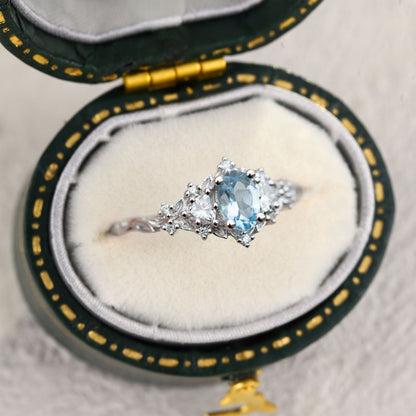 Unique Briar Rose Three Stone Oval Lab Aquamarine Ring