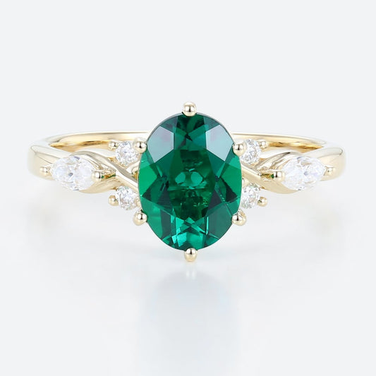 Unique Oval Emerald Split Shank Engagement Ring