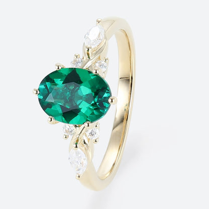 Unique Oval Emerald Split Shank Engagement Ring