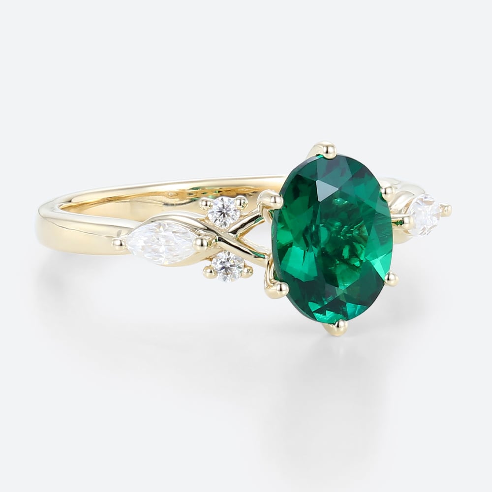 Unique Oval Emerald Split Shank Engagement Ring