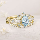 Unique floral engagement rings Oval Lab Aquamarine Flower Engagement Ring Set Delicate Aquamarine Leaf 18K Yellow Gold Wedding Ring Set
