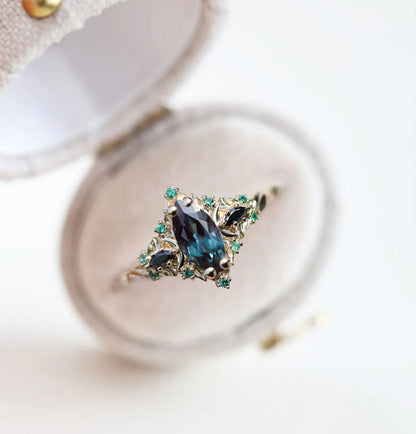 Unique Briar Moon Three Stone Marquise Lab Alexandrite and Lab Emerald Ring