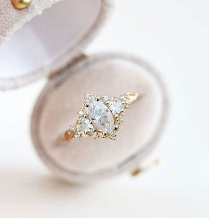 Unique Celeste Rose Three Stone Marquise Moissanite Ring