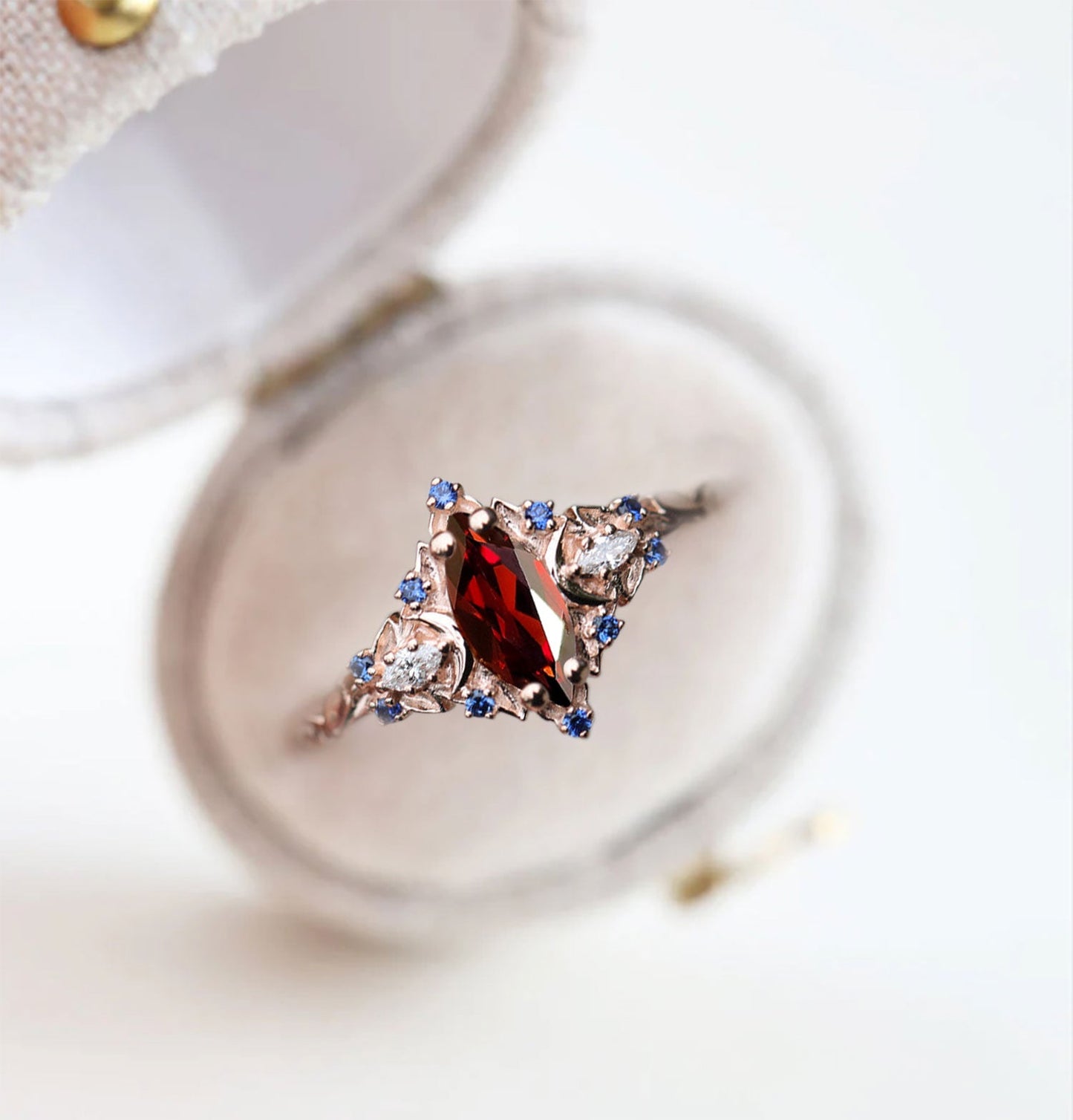 Unique Briar Moon Marquise Garnet and Lab Blue Sapphire Anniversary Ring