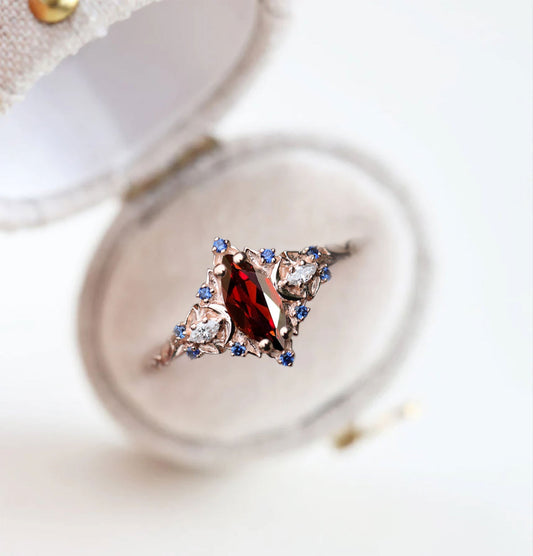 Unique Briar Moon Marquise Garnet and Lab Blue Sapphire Anniversary Ring