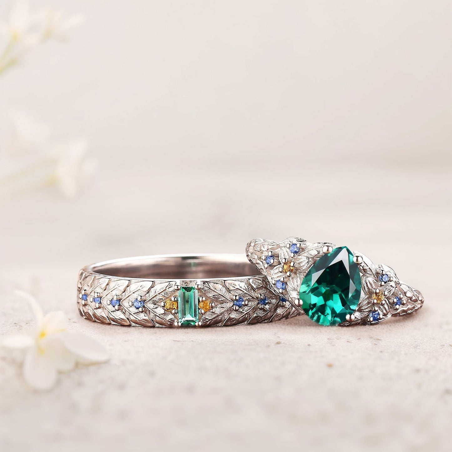 Unique Pear Lab Emerald His and Hers Matching Wedding Ring Set