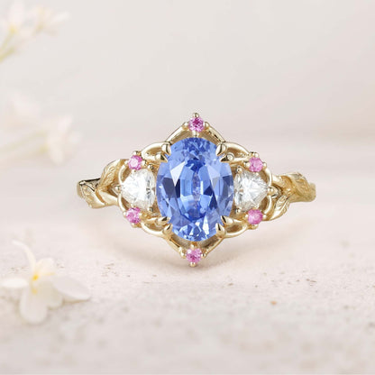 Unique Three Stone Oval Lab Sapphire Engagement Ring