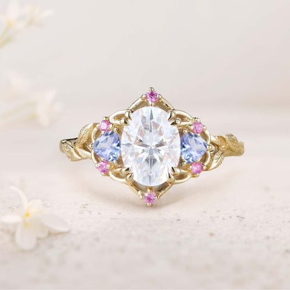 Unique Three Stone Oval Moissanite and Blue Sapphire Engagement Ring