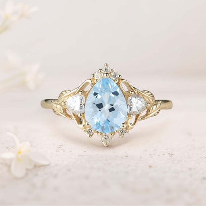Unique floral engagement rings Pear Lab Aquamarine and Moissanite side stones Leaf Ring Engagement Ring