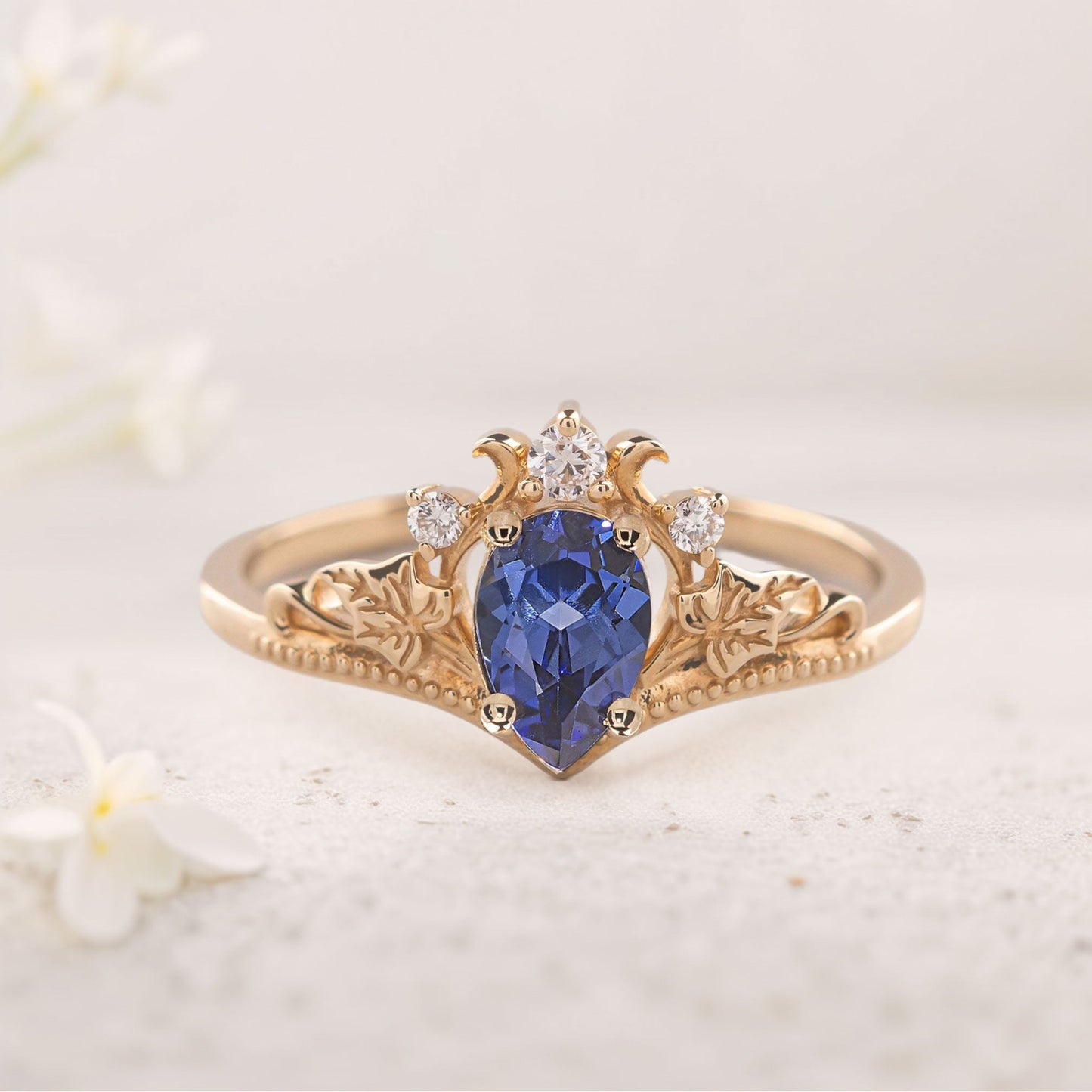 Unique Pear Vivid Blue Lab Sapphire engagement ring with ivy leaves Ring
