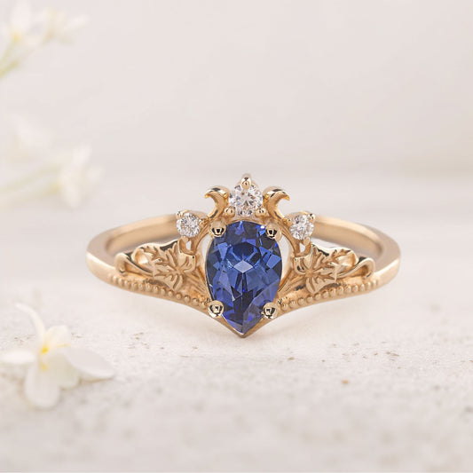 Unique Pear Vivid Blue Lab Sapphire engagement ring with ivy leaves Ring