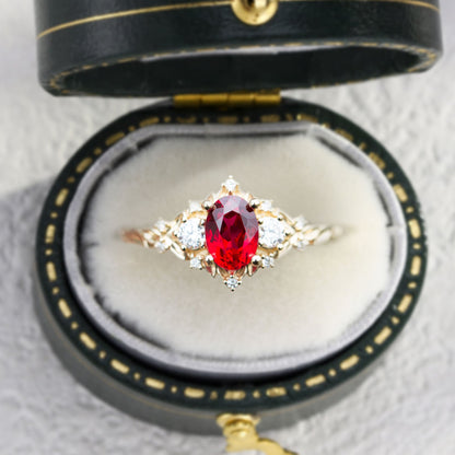 Unique Briar Rose Three Stone Oval Lab Ruby and Moissanite Ring