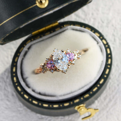 Unique Briar Rose Three Stone Oval Moissanite and Lab Pink Sapphire Ring