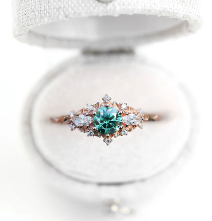 Unique Celeste Rose Three Stone Round Teal Moissanite Ring
