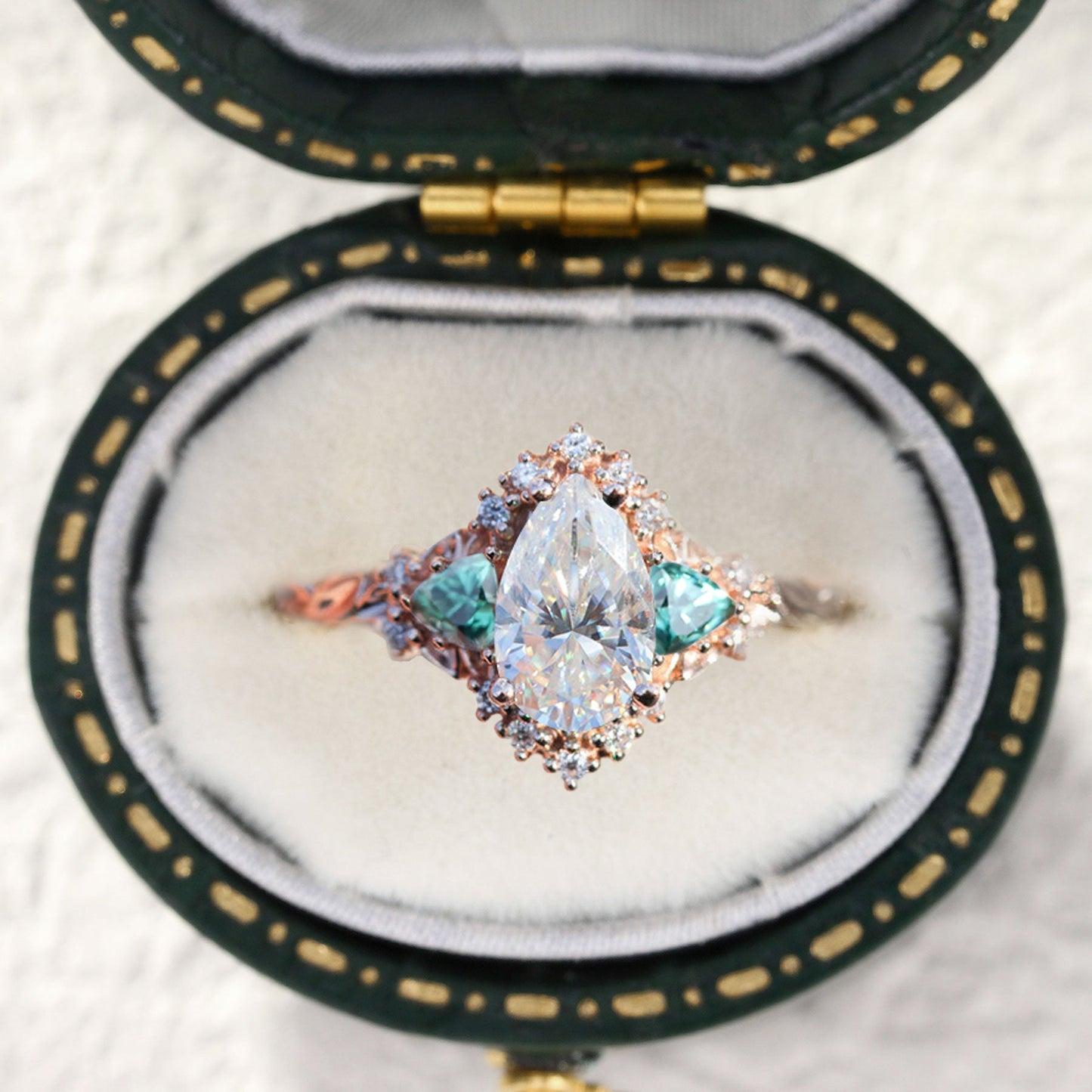 Customize your own Unique Briar Half Halo Pear Moissanite Ring