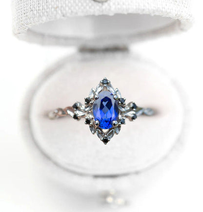 Unique Floral Rose Oval Lab Sapphire and Black Moissanite Ring