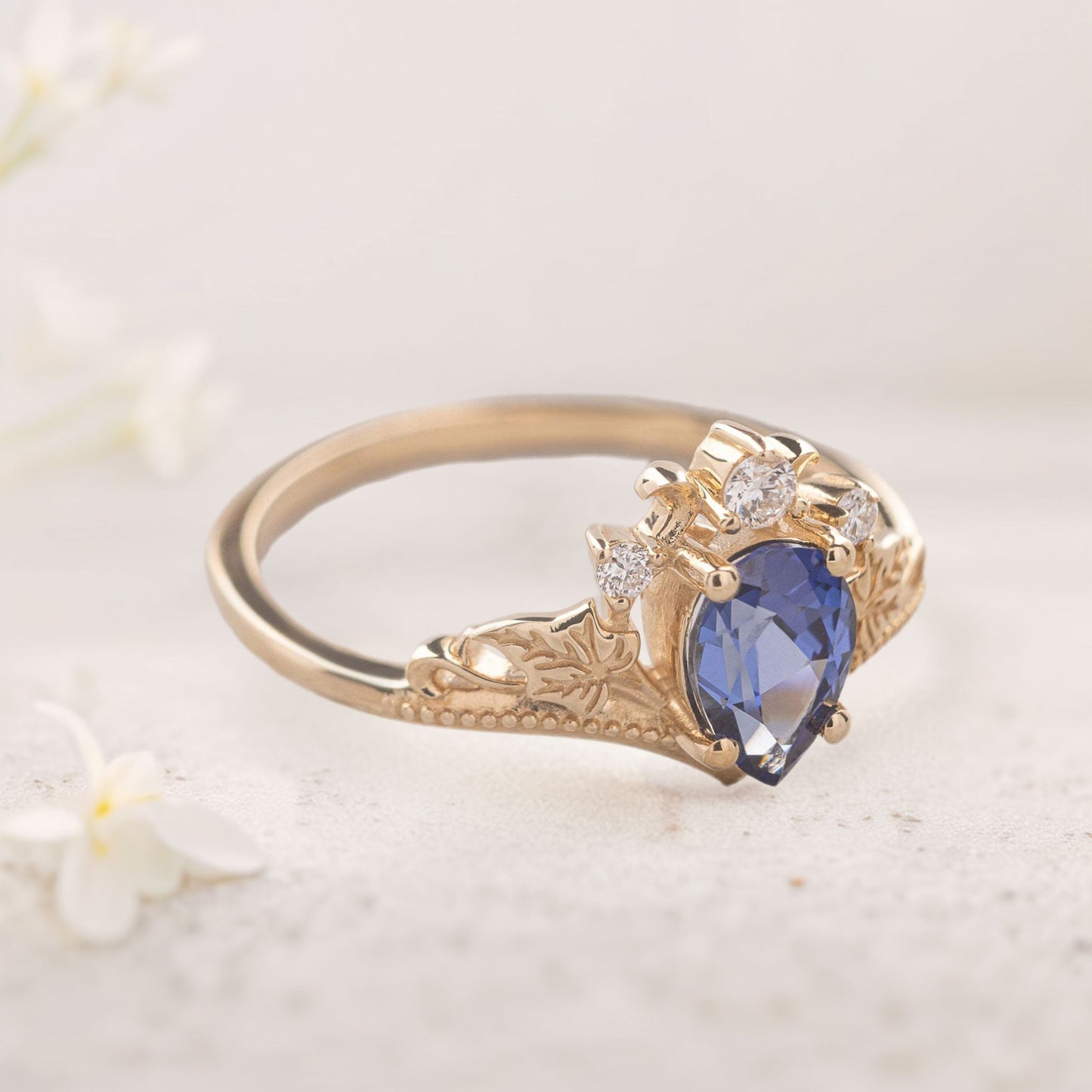 Unique Pear Vivid Blue Lab Sapphire engagement ring with ivy leaves Ring