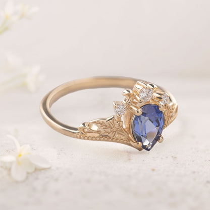 Unique Pear Vivid Blue Lab Sapphire engagement ring with ivy leaves Ring