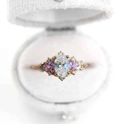 Unique Celeste Rose Three Stone Oval Moissanite and Lab Pink Sapphire Ring