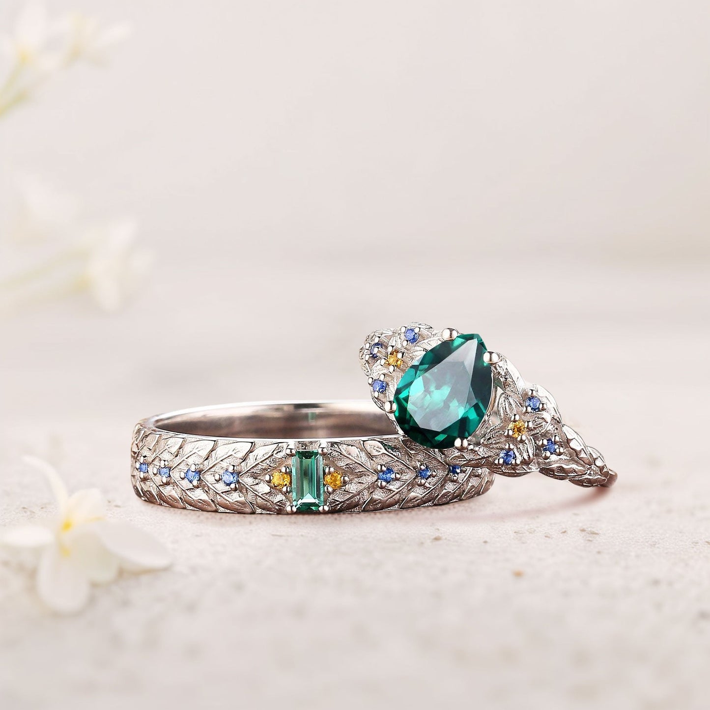 Unique Pear Lab Emerald His and Hers Matching Wedding Ring Set