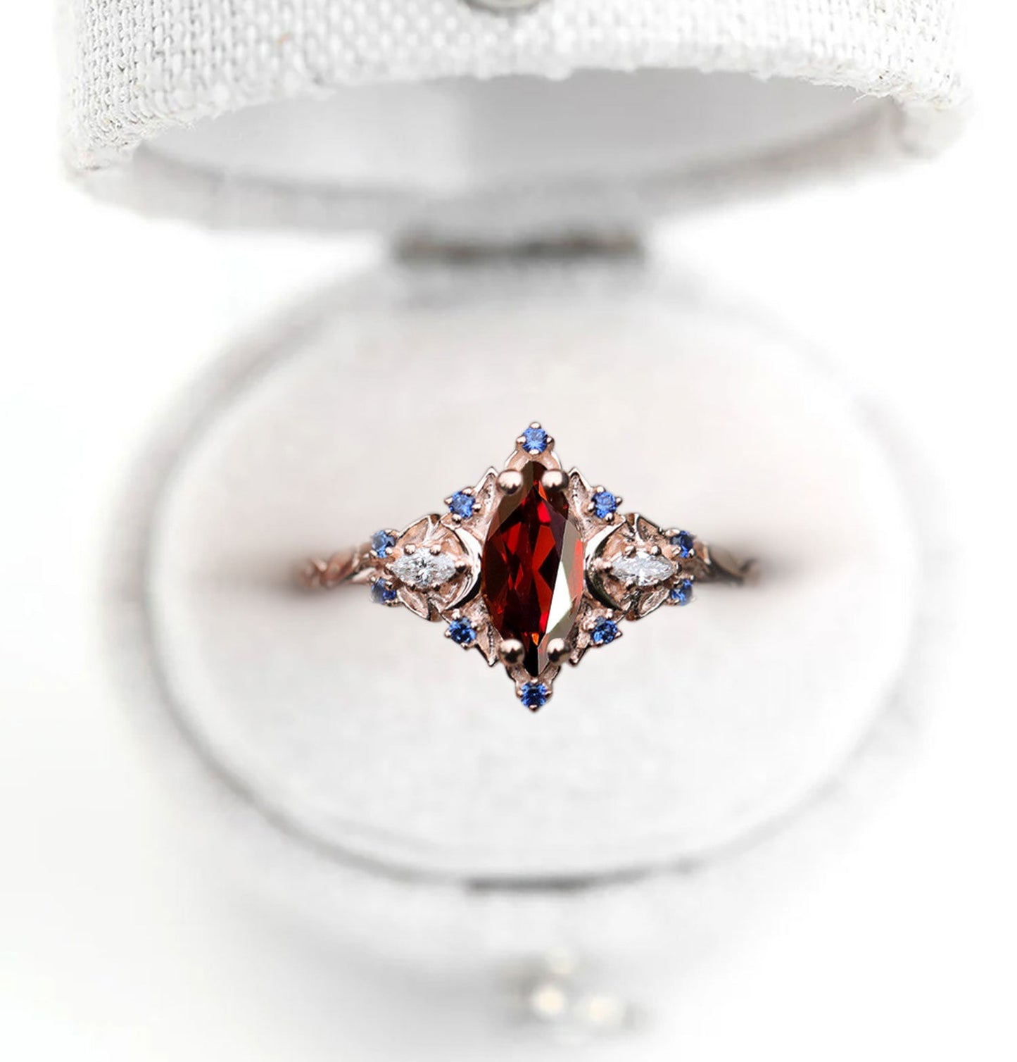 Unique Briar Moon Marquise Garnet and Lab Blue Sapphire Anniversary Ring