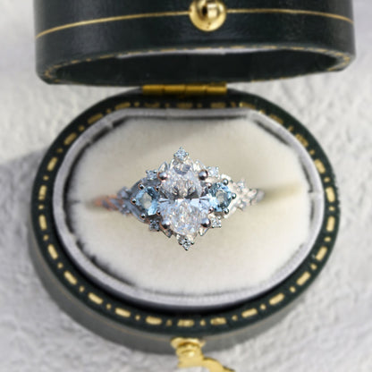 Unique Briar Rose Three Stone Oval Moissanite and Lab Aquamarine Ring