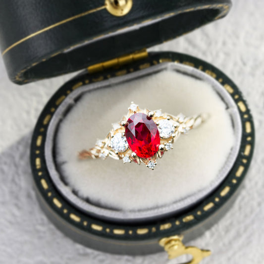 Unique Briar Rose Three Stone Oval Lab Ruby and Moissanite Ring