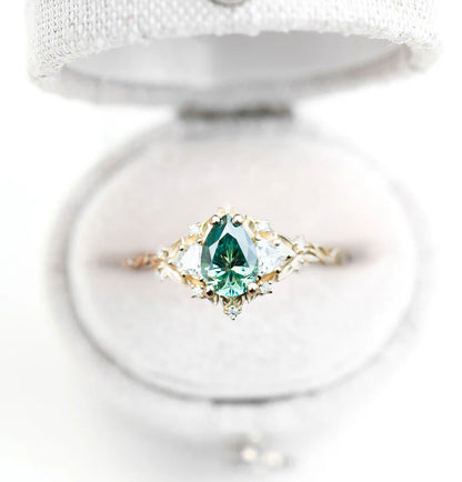 Unique Celeste Rose Three Stone Pear Teal Moissanite Ring