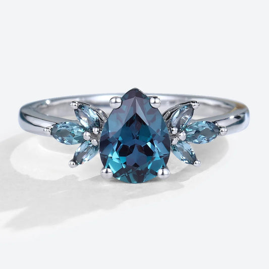 Unique Pear Lab Alexandrite Engagement Ring with Petal Accents