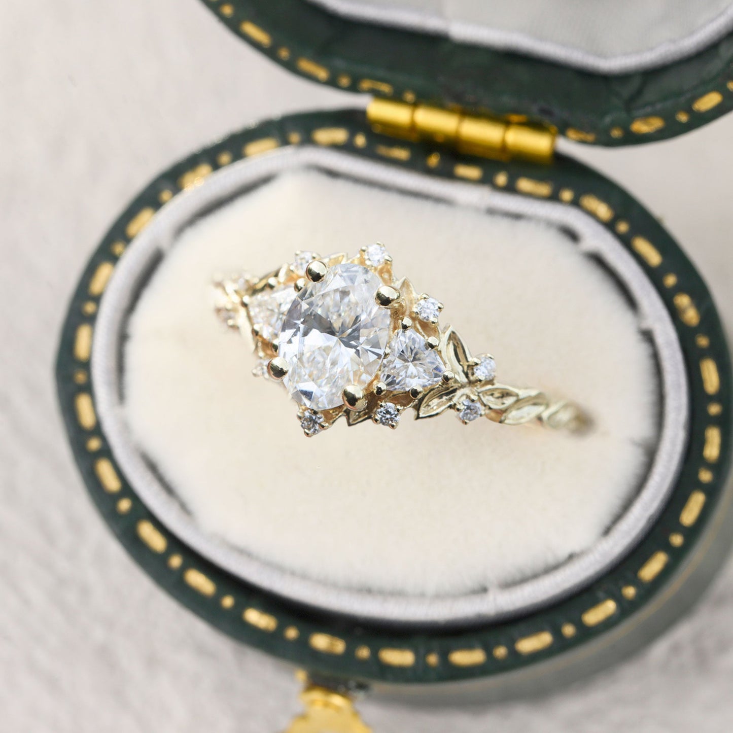 Unique Briar Rose Three Stone Oval Moissanite Ring