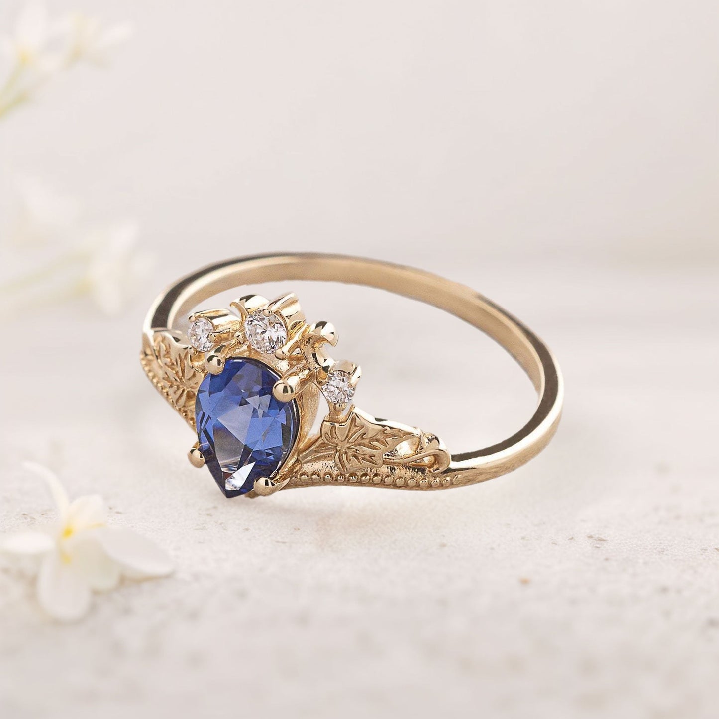Unique Pear Vivid Blue Lab Sapphire engagement ring with ivy leaves Ring