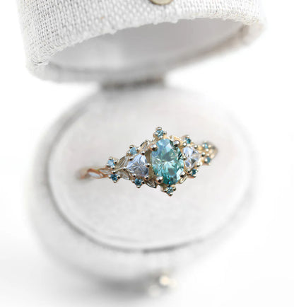 Unique Celeste Rose Oval Teal Moissanite Ring