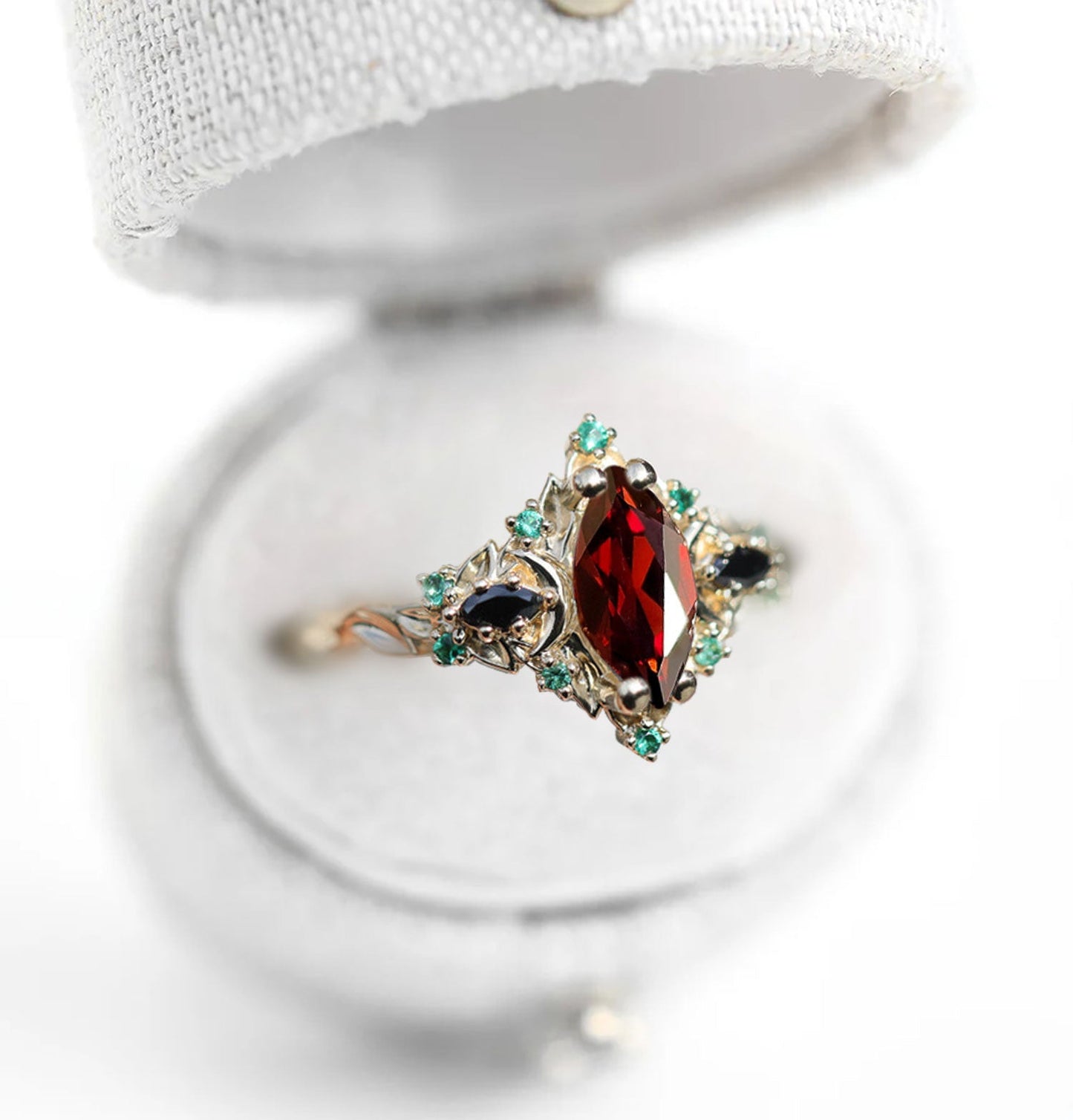 Unique Briar Moon Three Stone Marquise Garnet and Lab Emerald Ring