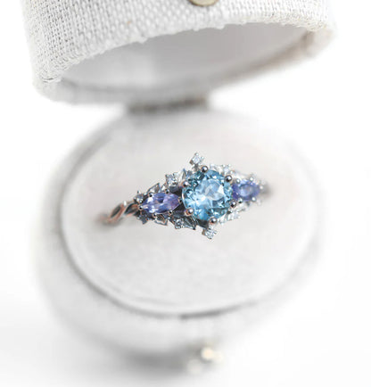 Unique Celeste Rose Three Stone Round Lab Aquamarine Ring