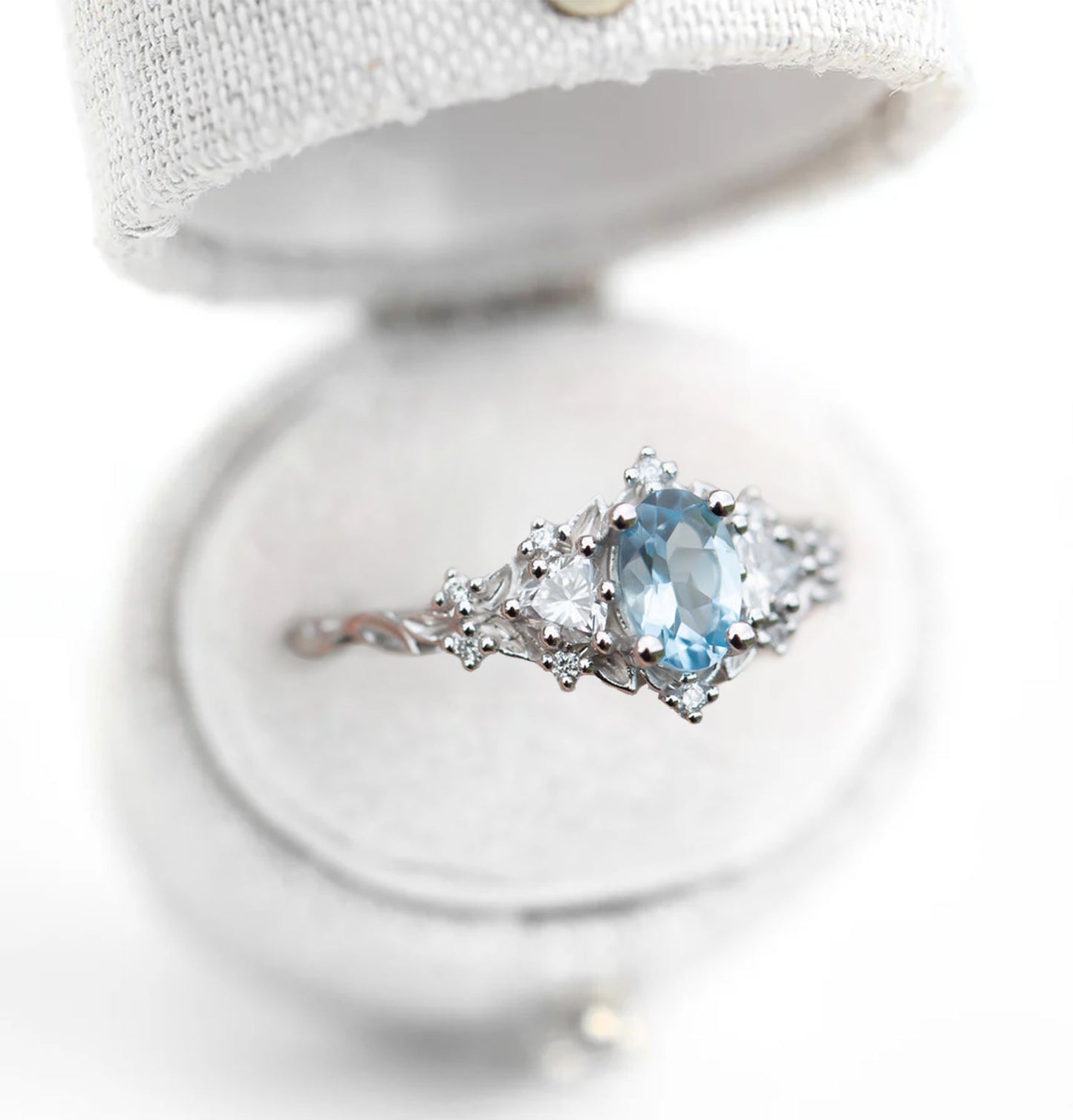 Unique Celeste Rose Three Stone Oval Lab Aquamarine Ring