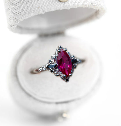 Unique Aurora Three Stone Marquise Ruby and Black Onyx Ring