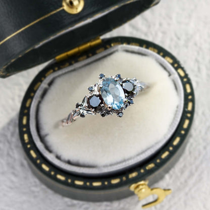 Unique Briar Rose Three Stone Oval Lab Aquamarine and Black Moissanite Ring