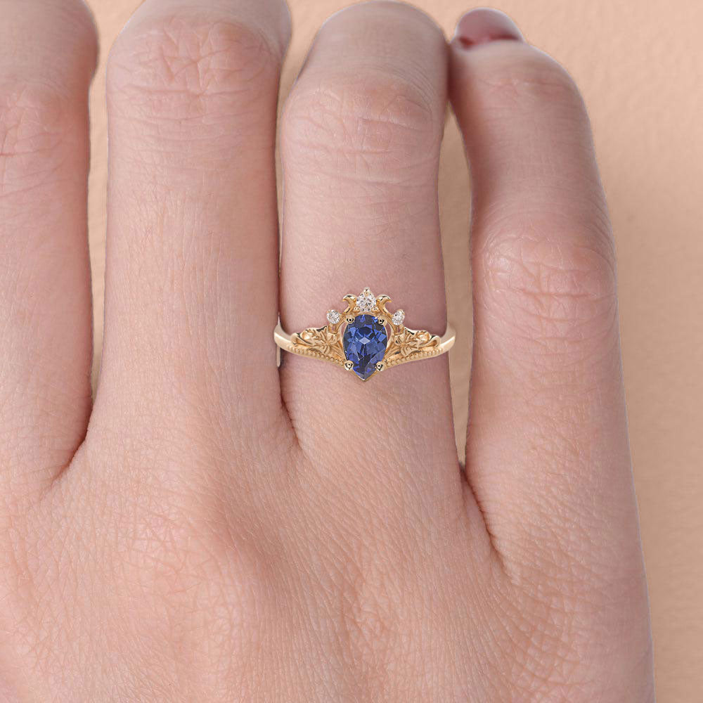 Unique Pear Vivid Blue Lab Sapphire engagement ring with ivy leaves Ring