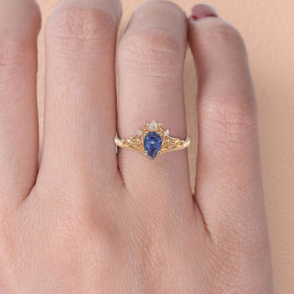Unique Pear Vivid Blue Lab Sapphire engagement ring with ivy leaves Ring