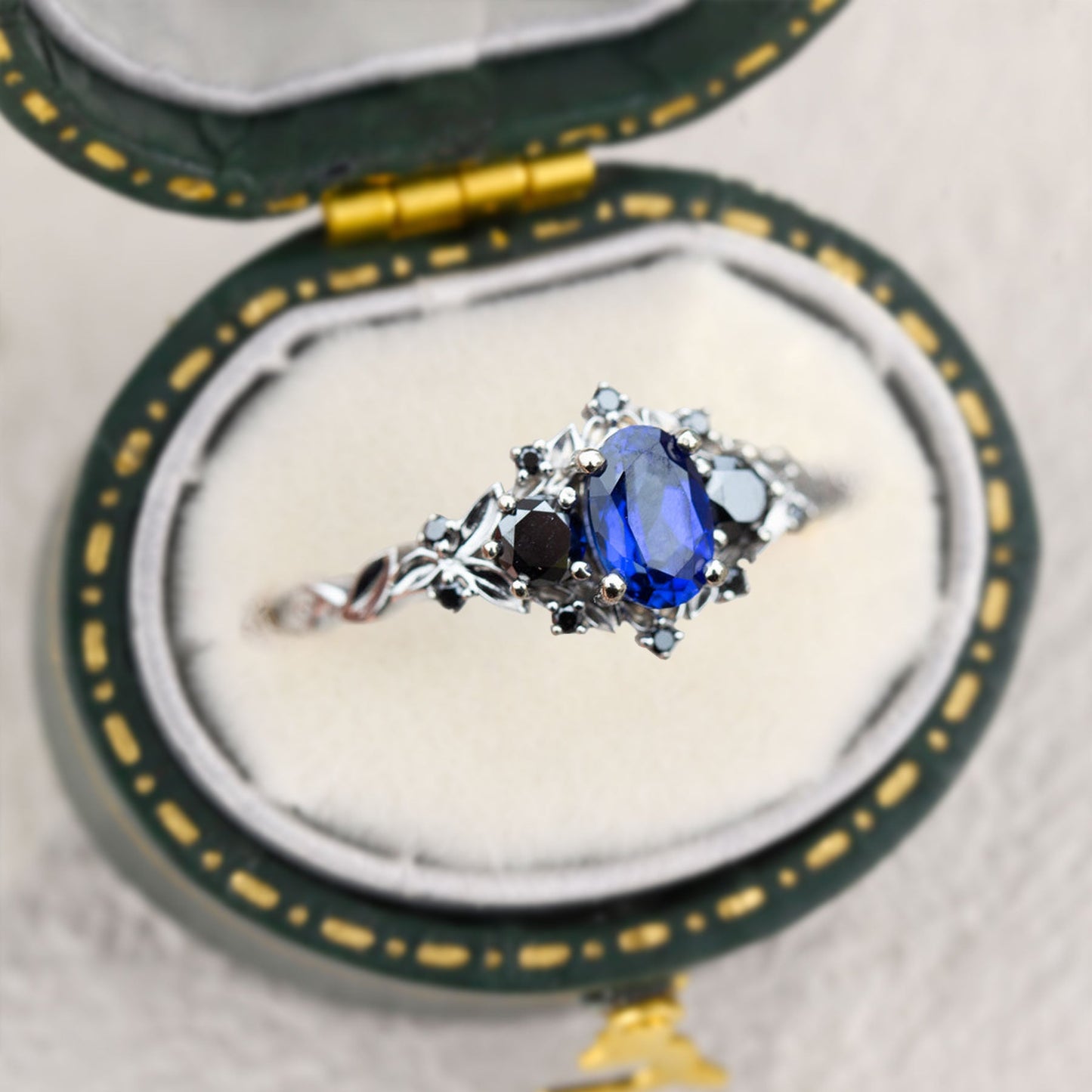 Unique Briar Rose Three Stone Oval Lab Blue Sapphire and Black Moissanite Ring