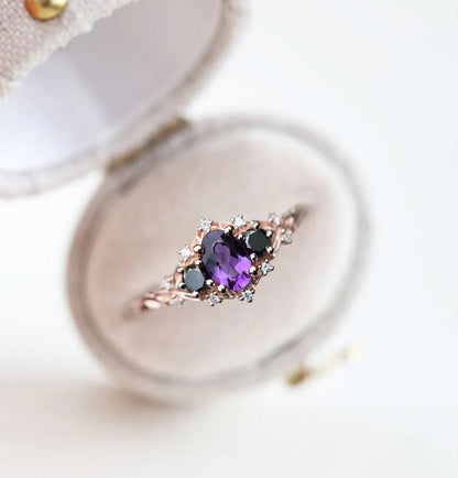 Unique Celeste Rose Three Stone Oval Amethyst and Black Moissanite Ring