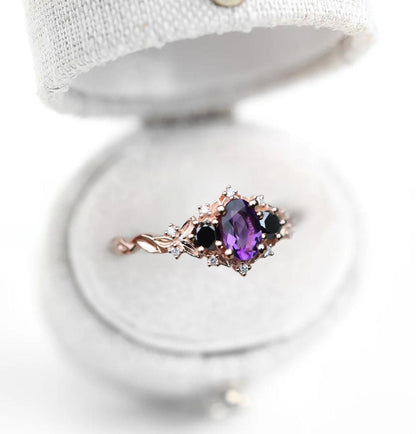 Unique Celeste Rose Three Stone Oval Amethyst and Black Moissanite Ring
