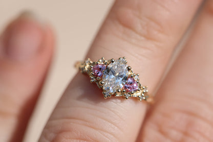 Unique Celeste Rose Three Stone Oval Moissanite and Lab Pink Sapphire Ring