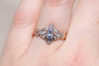 Unique Briar Bezel Three Stone Oval Moissanite Ring