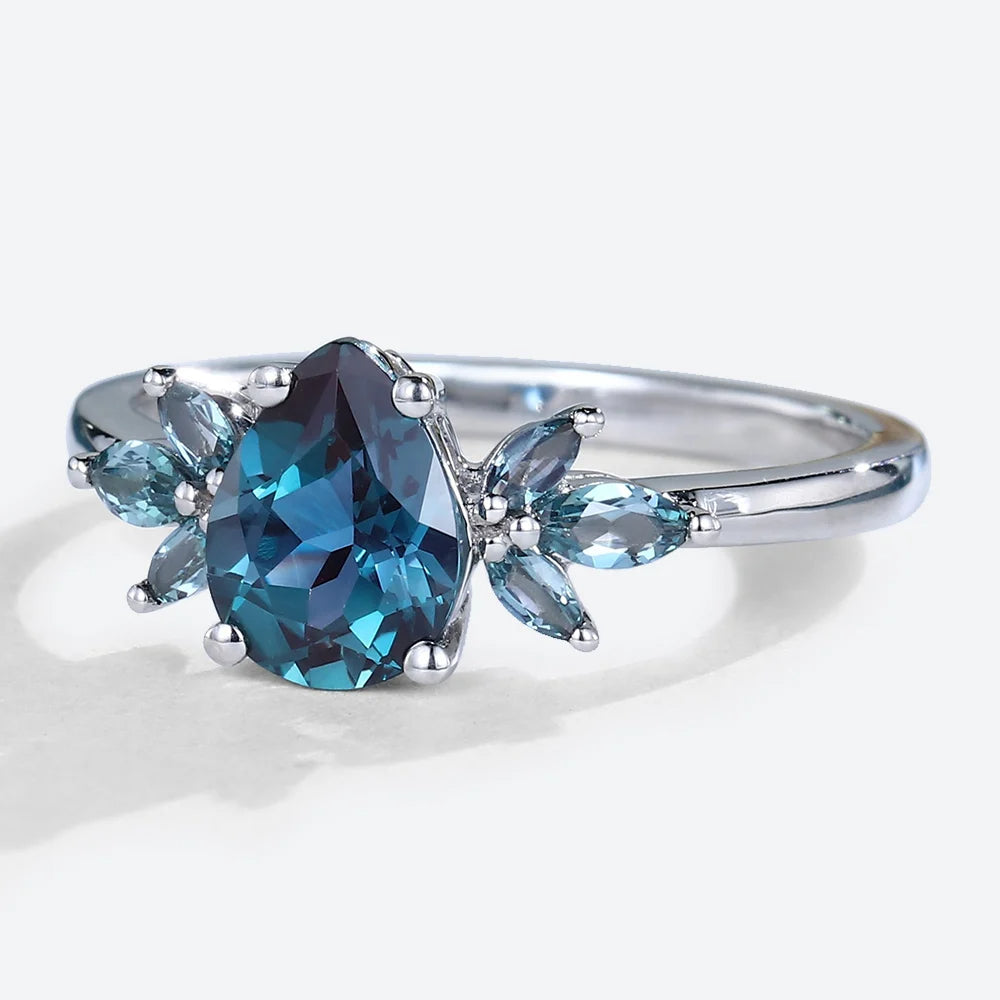 Unique Pear Lab Alexandrite Engagement Ring with Petal Accents