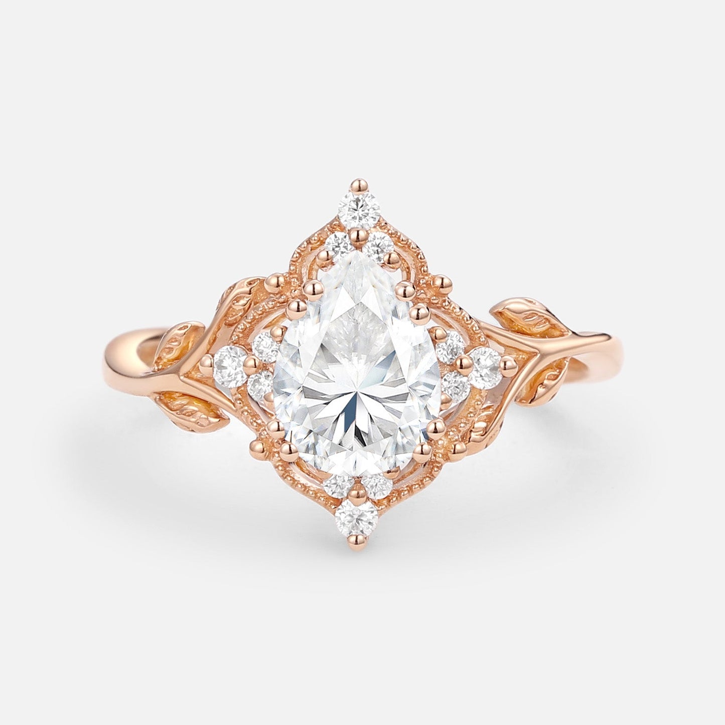 Vintage floral engagement rings Pear Moissanite Leafy Engagement Ring